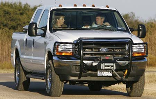 Illustration for article titled Pics: Bush giving world leaders rides in his F250